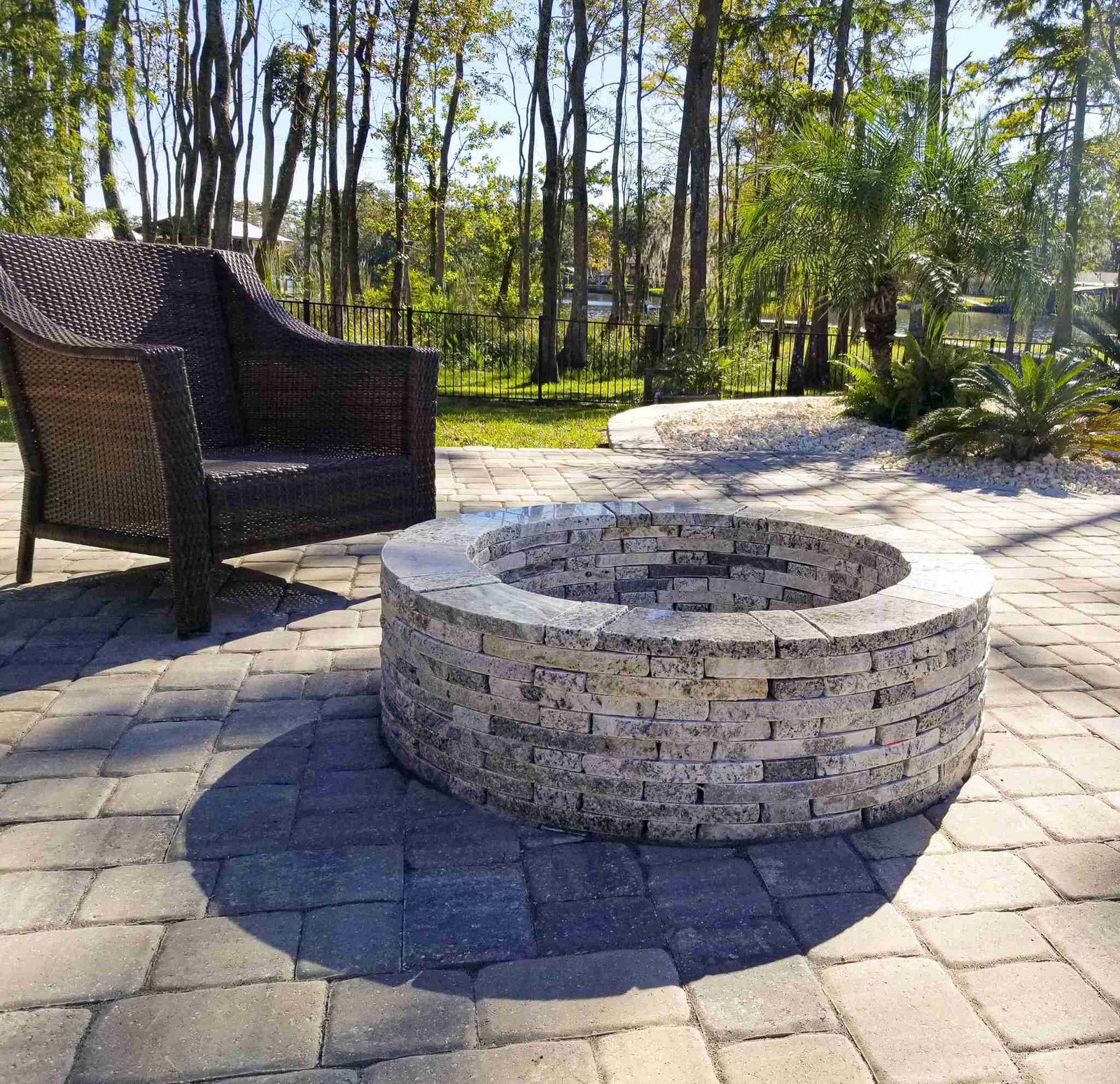 Custom fire pit with seating wall Jacksonville FL